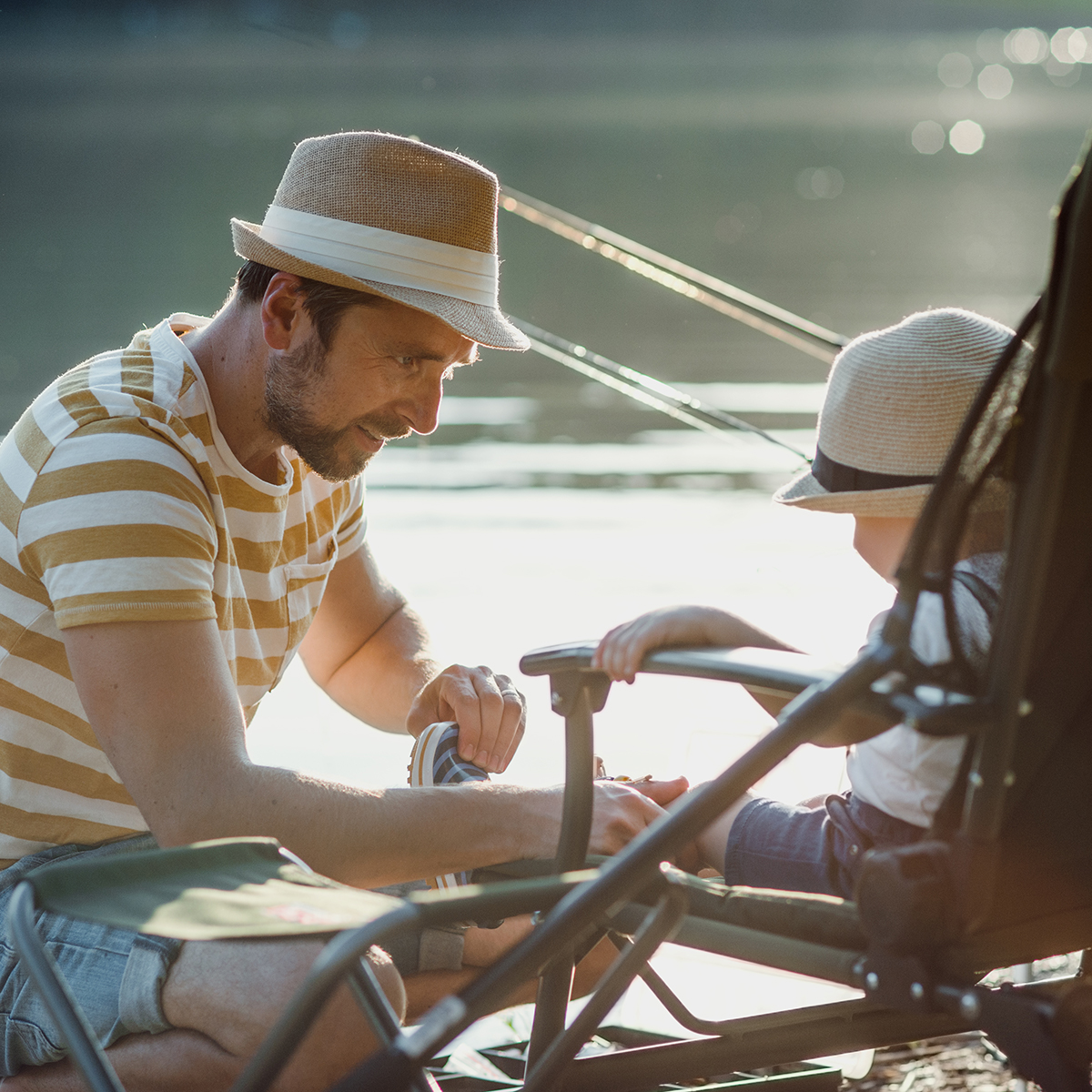 Gers campsite, Whakalodge, a father and son fishing © Adobe Stock